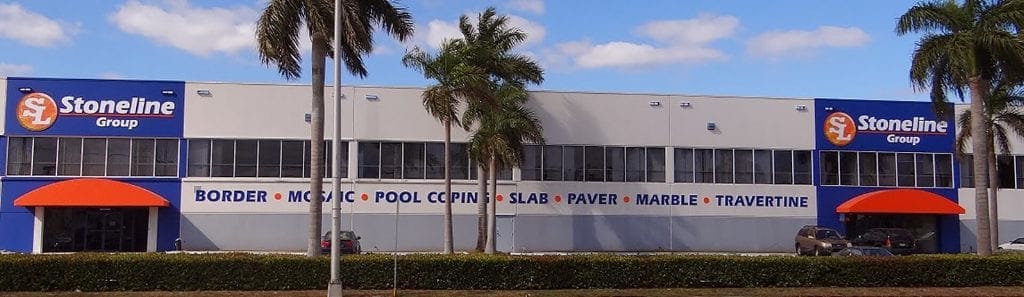 Stoneline Group’s natural stone quarry with premium tile samples on display.