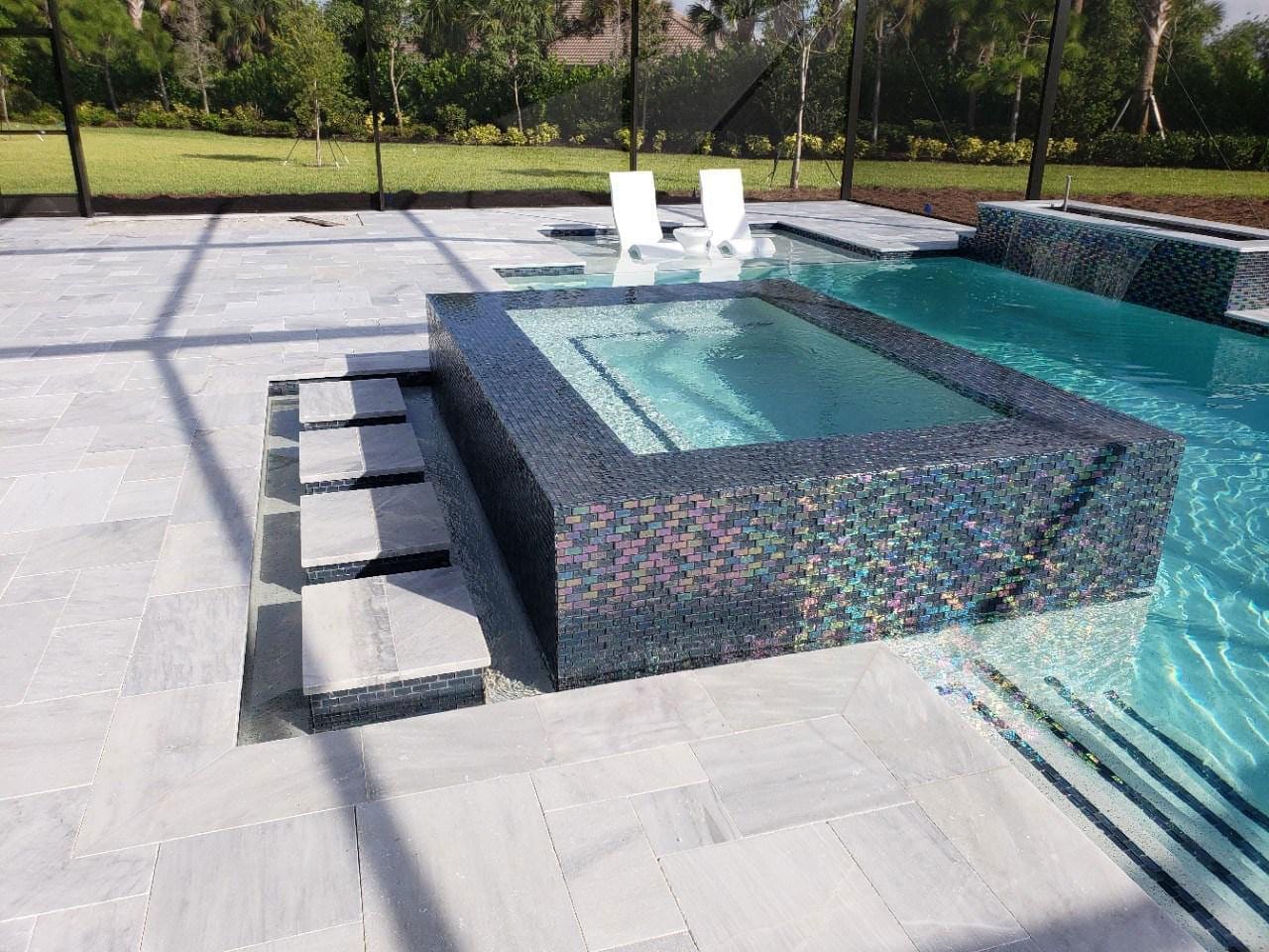 Modern patio layout using high-quality natural stone veneers.