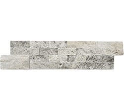 A rectangular panel made of staggered, textured stone tiles in varying shades of gray and white, this Silver Veneer creates a natural, modern look ideal for wall cladding or decor.