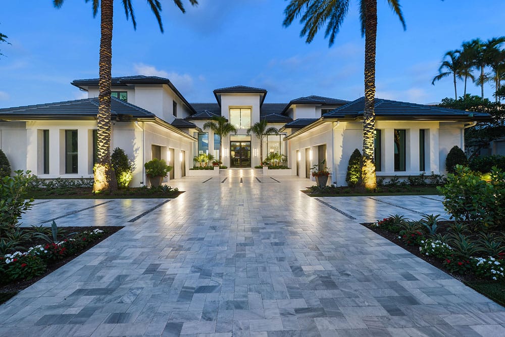 A luxurious driveway featuring natural stone pavers from Stoneline Group Exterior Gallery, adding elegance and durability