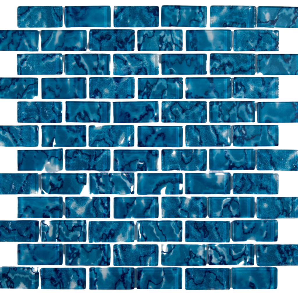 Maldives Collection glass mosaic tile in deep blue shades, ideal for luxury interiors, pools, and modern architectural designs
