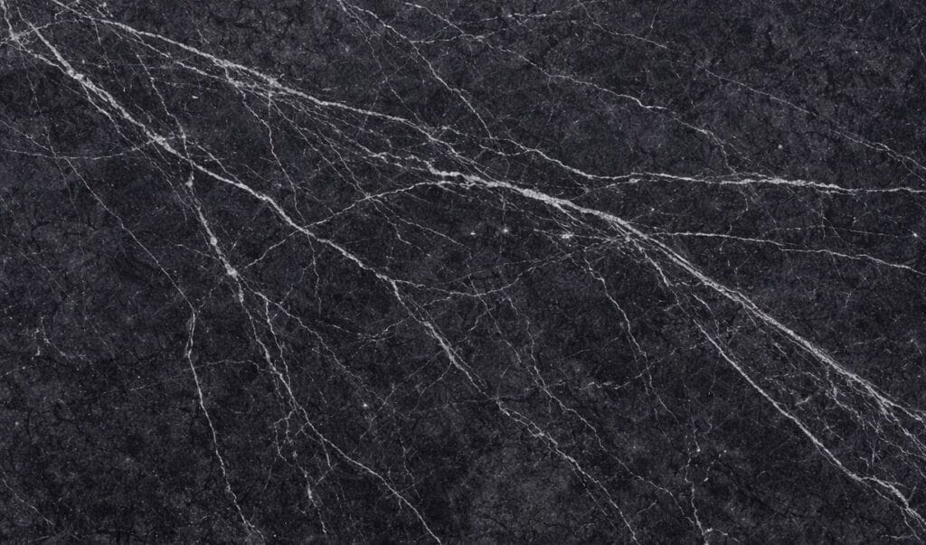 Nero Marquina marble tile with a deep black background and dramatic white veining