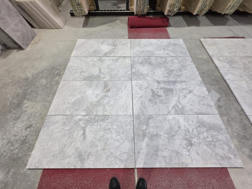 White Mist marble tile with soft white tones and cloudy grey veining