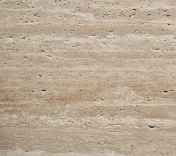 Ivory unfilled travertine tile with warm beige tones and natural linear movement